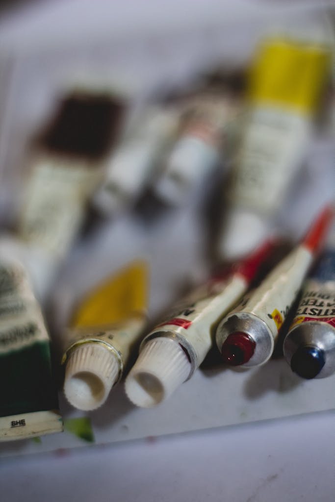 A detailed close-up of vibrant paint tubes, perfect for artists and creative projects.