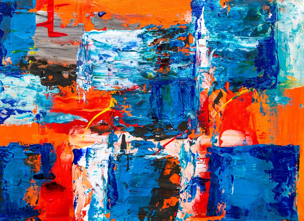 Dynamic and colorful abstract painting with bold brushstrokes and vivid colors.